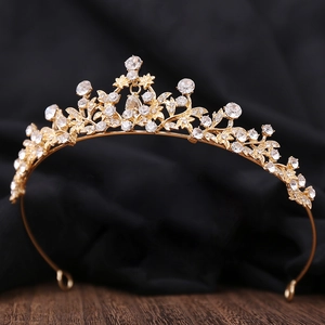 Elegant gold bridal tiara with sparkling rhinestones and vintage floral leaf design