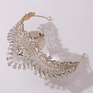 Exquisite gold crystal bridal crown with pear-shaped centerpiece and marquise stones