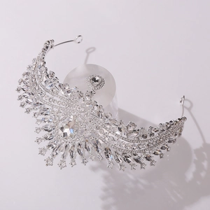 Macro detail of silver bridal crown showing pear-shaped crystal and intricate zircon setting