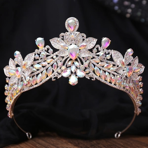 Macro shot of silver bridal crown with AB rhinestones and intricate floral metalwork