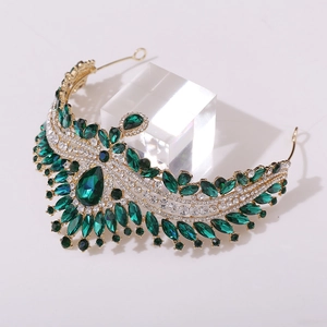 Elegant gold bridal crown with emerald green crystals and sparkling white gemstones
