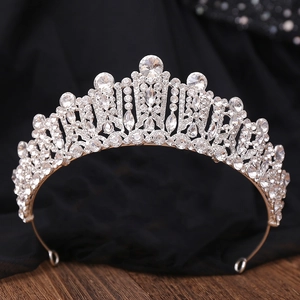 Detailed view of silver crystal bridal crown with intricate rhinestone craftsmanship