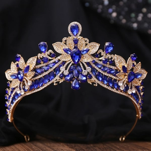 Macro shot of bridal crown with deep blue teardrop stones and clear rhinestones