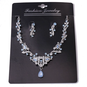 Elegant bridal jewelry set with blue teardrop crystals and sparkling rhinestones
