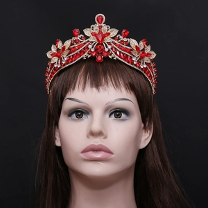 Luxury bridal crown with red rubies and crystals on gold floral base for weddings