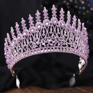 Macro shot of silver alloy baroque crown with lavender crystals and fixing comb