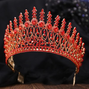 Detailed view of red rhinestone baroque crown for pageant or bridal headpiece decor