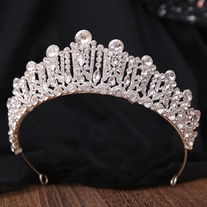 Detail of baroque bridal tiara with sparkling crystal rhinestones and silver alloy base