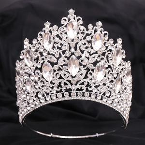 Macro detail of luxury silver crown featuring marquise crystals and intricate rhinestones
