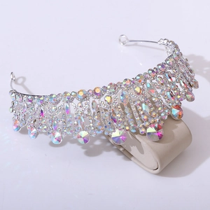 Detail of silver bridal crown featuring shimmering rainbow AB rhinestones and metal loops