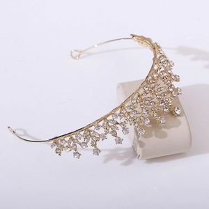 Elegant gold bridal crown with sparkling rhinestones and delicate leaf branch design