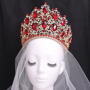 Luxury gold bridal tiara with red crystals and leaf motifs for weddings and pageants