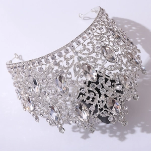 Macro shot of luxury silver crystal crown featuring marquise-cut rhinestones and leaf details