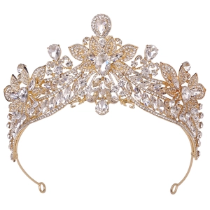 Macro view of gold alloy bridal crown featuring intricate floral rhinestone details