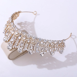 Detailed macro of golden wedding tiara with sparkling crystal rhinestones and fixing holes