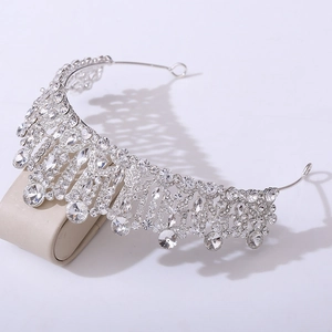 Detailed view of baroque bridal crown with silver alloy and sparkling crystal rhinestones