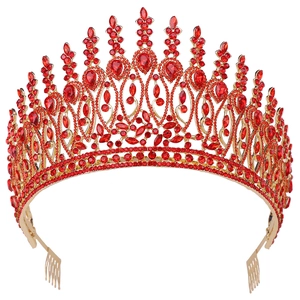 Detailed view of Baroque gold tiara with large red teardrop crystals and hair combs
