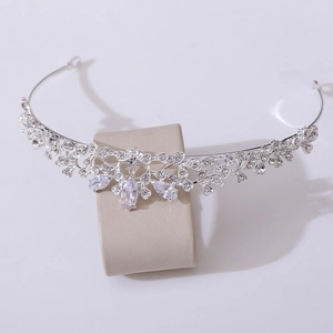 Detailed view of silver bridal crown featuring sparkling zircons and marquise crystals