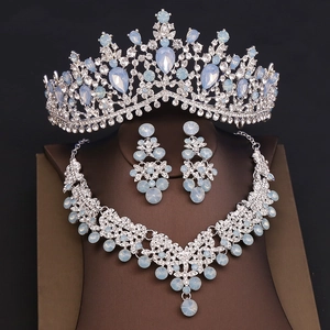 Luxury silver bridal jewelry set with blue waterdrop crystals and rhinestone crown