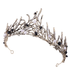 Detail view of handmade bridal crown featuring white pearls and black faceted beads