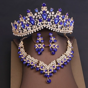 Macro shot of luxury bridal jewelry set with royal blue gems and sparkling white rhinestones