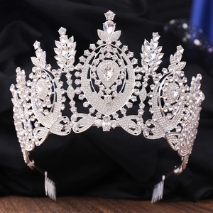 Macro shot of Baroque silver tiara with intricate crystals and sparkling rhinestones