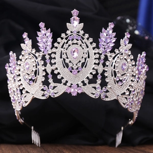 Detailed view of Baroque bridal crown with purple rhinestones and silver alloy base