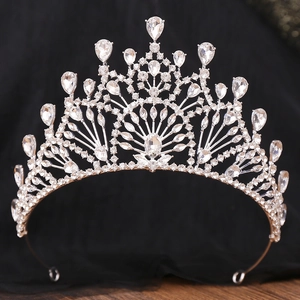 Detailed close-up of a silver baroque bridal crown with sparkling teardrop rhinestones