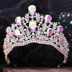 Detailed macro view of silver bridal crown with colorful teardrop crystals and AB rhinestones