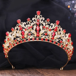 Luxury bridal jewelry set with golden crown, necklace, and earrings in red crystal