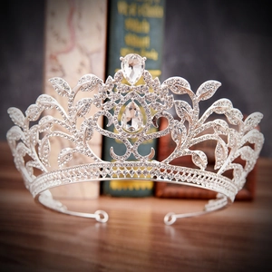 Macro detail of Baroque bridal crown with leaf crystals and silver teardrop stones