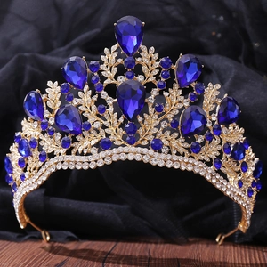Detailed view of Baroque crown with blue pear-shaped crystals and gold-tone alloy frame