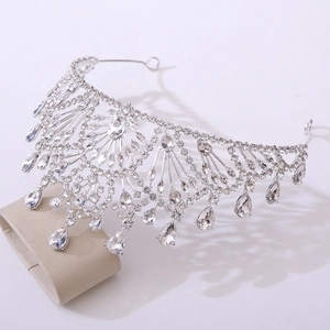 Detailed view of bridal silver crown with sparkling rhinestones in various cuts