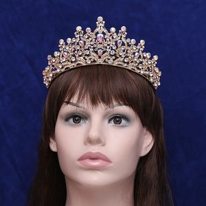 Exquisite gold bridal crown set with colorful rhinestones and sparkling crystals for weddings