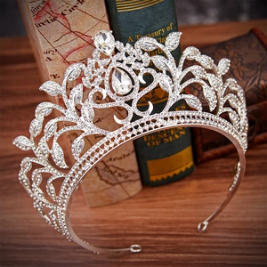 Luxury silver bridal crown featuring leaf vine design with brilliant pear-cut crystals