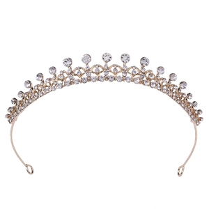Diadème de mariée doré élégant avec strass blancs étincelants au design symétrique