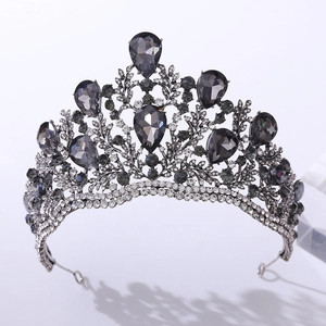 Detail of baroque bridal crown with dark grey crystals and leaf-shaped metal base