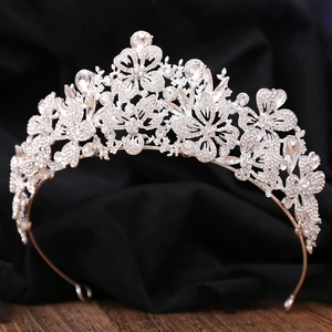 Detailed macro view of marquise rhinestones and crystal flower leaf on bridal crown