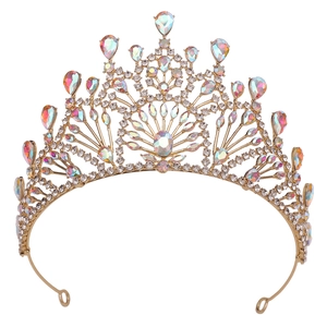 Detail of peacock-shaped bridal crown featuring gold metal frame and colorful rhinestones