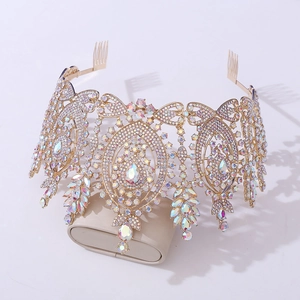 Detailed close-up of Baroque gold crown with AB rhinestones and side hair combs