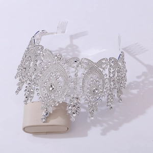 Detailed view of Baroque silver bridal tiara with sparkling crystal rhinestones and metal combs