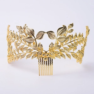 Detail of golden laurel leaf bridal hair comb with realistic metal texture and vintage style