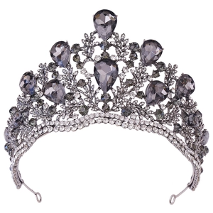 Detailed close-up of Baroque crown featuring grey pear-cut crystals and leaf motifs