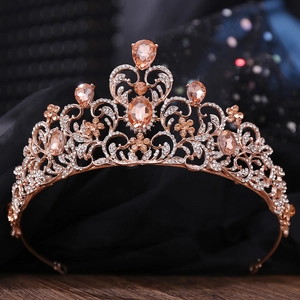 Detailed macro view of rose gold bridal crown with champagne pear-shaped crystals