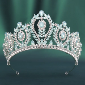 Detailed macro view of bridal tiara with light blue opals and crystal rhinestones