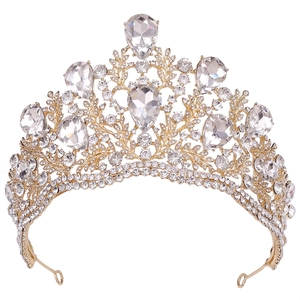 Detailed view of luxury baroque crown with leaf motifs and teardrop crystal settings