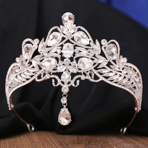 Macro detail of Baroque bridal crown with silver heart crystals and teardrop pendant
