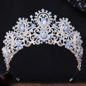 Detailed macro view of luxury silver bridal crown with light blue teardrop rhinestones