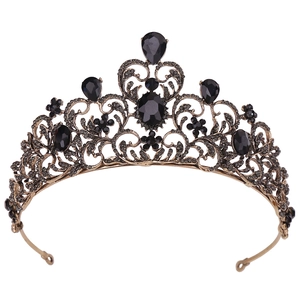 Detailed view of vintage bronze bridal crown with large black waterdrop rhinestones