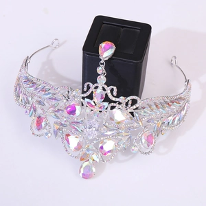 Close-up of silver bridal crown showing AB iridescent rhinestones and fringe details